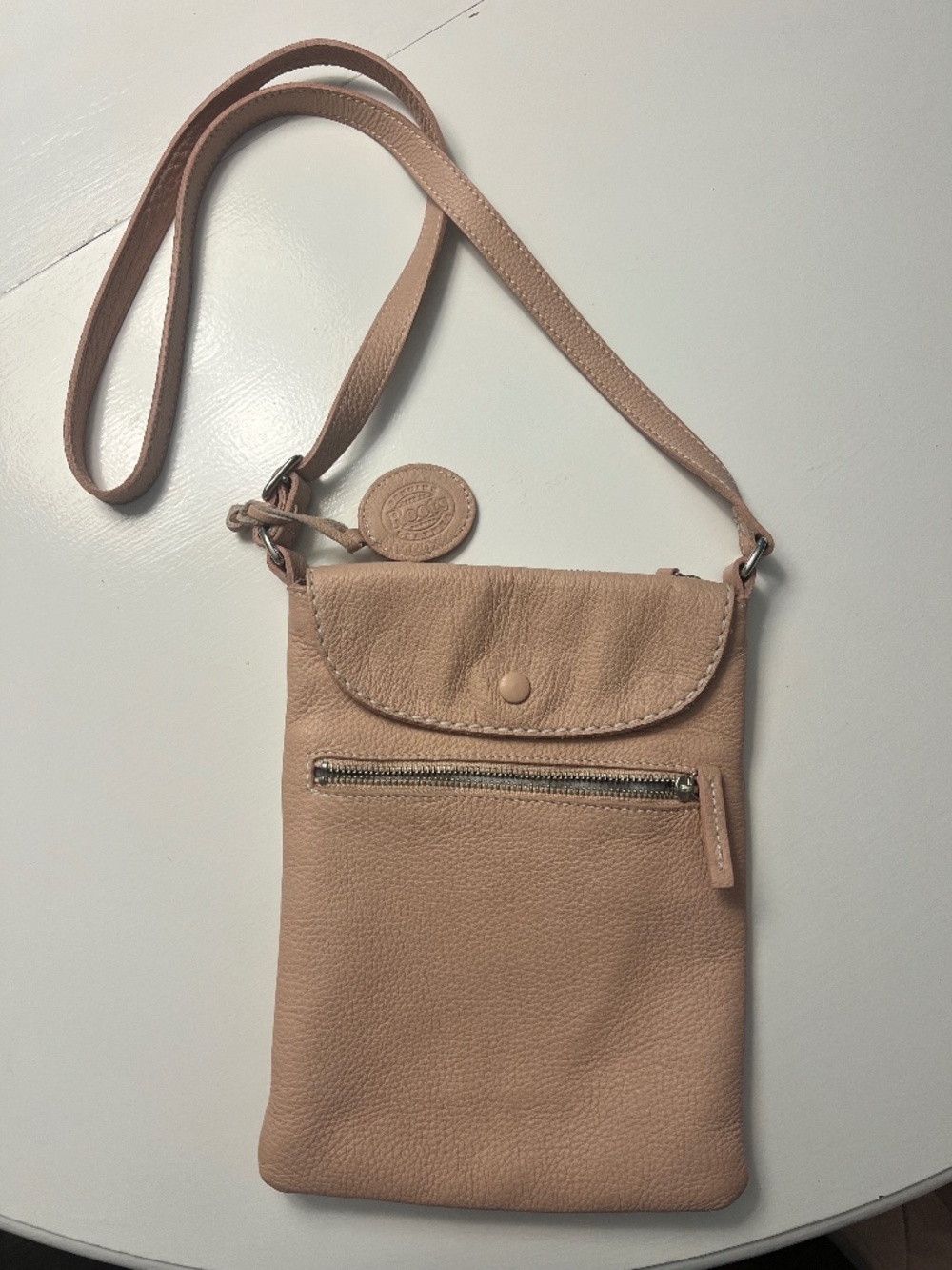 Roots Canada leather adjustable crossbody handbag- dusty pink